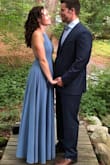 Straps are adjustable, had to hem it a little bit, and was able to wear some pasties for a bra. Lots of compliments at my cousins wedding. - Katherine M.