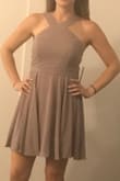Absolutely love the color, the cut is flattering, and the dress fits pretty true to size. Its the tiniest bit short, and falls well above the knee (but these days, I'm a little more conservative). Not the highest quality dress I've ever worn (the zipper seemed the tiniest bit off in the back), but am excited to wear it to many weddings this year! - Brynn J.