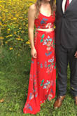 I ordered this dress knowing that the style (crop top) and color may not work well for me. I'm a new mom and this was my first clothing purchase after having my baby... I hoped I would like it, but wasn't sure if I'd be comfortable in it. Turns out, I LOVE IT! Has such a flattering fit. The fabric is flowy and soft, but thick enough so you don't feel naked! The dress is a bit long, but heels helped out a bunch. Perfect for an outdoor wedding! - Jeanelle B.