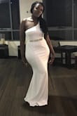 I bought this dress from Australia and it arrived within two weeks. Bought a large as I wear an Australian 12. The dress was a little loose but still beautiful. Such great quality for the size. - Rutendo M.