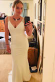 I bought this for my rehearsal dinner this October. Really love the dress, very elegant and good quality. A little big in the straps but some creative bra/cutlet maneuvering should help! - Laura D.