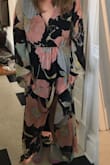 I bought this to wear to a beach wedding! I really like the print, but the large was way too big on me (apart from just the length). I exchanged for a medium and it looked much better. Will need to get it hemmed, and may put in a stitch at the top so that it doesn't open too much.The first photo is the large, the second is the medium! - Molly N.