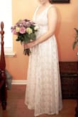 It fit perfectly. I was a little anxious because my body fluctuates and sometimes I'm a S or a M depending on the dress, but I went with a S and it fits just right. It's a little long about 3 inches but my mom was able to hem it without an issue. I wore it without a bra and felt secure. I LOVED THIS DRESS! - Karolina K.