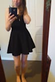 Dress arrived in a very short amount of time. Product was exactly as described. Material is thick and amazing quality, with no faults. Looks beautiful on and runs true to size. - Claire T.
