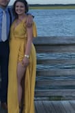 I purchased this for a wedding I was attending near the beach and I am SO glad I did. The material is thin (but not sheer) and glowy so I stayed cool throughout the ceremony and reception. It was a little on the longer side for my height but I paired it with some 4 inch heels and it was perfect. Paired it with a gold layer necklace and some hoops and received endless compliments throughout the night. PURCHASE THIS DRESS - Rachel S.