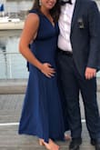 LOVED this dress. You can wear it so many ways so I don't feel like I was paying for one dress but several! It's a bit dressy so worked well for a downtown wedding. Although a deep cut still very tasteful. Can't wait to wear it again! It was a little short for me with heels which was surprising, but overall a win! - Marissa M.