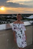 I bought this dress to wear on a date night with my husband while we were on vacation. I love the off the shoulder and the flowery design is so pretty! I felt so good in this dress! I highly recommend that you need this in your closet. ;) - Kayla V.