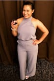 I absolutely loved this jumpsuit, it's classy, comfortable and chic. I wore it to a wedding and I got many compliments. I am 5 feet tall therefore my grandma helped me out on hemming and fixing some of the places that were a bit baggy from the top and of course too long from the bottom. It was a beautiful piece. - Miriam N.