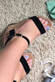 This shoe has a wonderful fit! Slips on like a slipper and the strap is almost like a nice velvet! Although this shoe is a tiny bit to small they are easily able to be worn for a long time! The white seemed to be the popular color in this style but the black is super nice and sleek look! - Elle C.