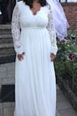 I was worried about the size but it fits perfectly, very happy with the dress! - Gina C.