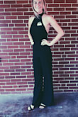 If I could afford it I would buy this jumpsuit is ever color!! The waistline gives you legs for days, the halter top neckline is very slimming, and I am in love with the back!! The material is so nice and very classy! - Hailey H.