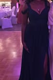 I was the MOH in a wedding and this dress was perfect. I did have it altered because I am busty. I had the cleavage sewn up a bit and the straps adjusted to be tighter. The small fit great. Sorry my pics are not great, but this dress was pretty. I loved it. I have a little gut too so I needed help getting the zipper up. (The cost of having curves). But I felt very secure once the dress was zipped. - Jessica S.