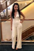 It fit so perfectly and I wore it with some 3 1/2 inch heels. I was scared that the legs would run short because my legs are super long but no, it fit so perfect! I wore it on a cruise and got several compliments from strangers throughout the night! - Guadalupe B.