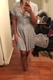 I ordered a Small which fits nicely, but I think maybe I could have pulled off an XS too. It has a tie in the waist, so that helped cinch it in. LOVE the fit and cut of the dress but I really am not the biggest fan of the print. I kept it though!
EDIT: DO NOT BUY THIS DRESS. IT WILL SHRINK WHEN WASHED. Even hand washed. - RaeAna E.