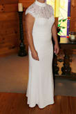 Dress fit perfectly all but the length. I read the reviews so was expecting it plus I am only 5'3 not much is good length for me. Only complaint was UPS not Lulu's. I paid the extra to have dress shipped within a few days and it actually arrived the day before we left to get married so time was pressed to have it hemmed. But it was definitely not the companies fault and they did reimburse me the extra paid for faster shipping. Dress fit perfect, many compliments I will definitely be buying again. - Christine C.