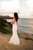 Gorgeous dress. Buy a size larger. I wore it for my wedding in Hawaii. - Katrina B.