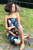 It fits loose on the bust area. Got a small, had to wear a strapless bra in order for the romper to stay in place. Other than that it's a beautiful romper!! Received a lot of compliments! - Nemesis M.
