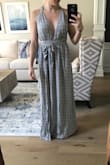 I liked this dress a lot, although it was very low cut. It could easily be pinned so the neckline is not as plunging. The pattern is very pretty and neutral. I also liked how the straps could be tied a variety of ways. Was very long on me but I'm short haha - Ashley E.