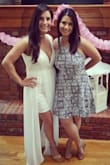I wore this for my bridal shower and loved it! I did have to get it hemmed and I did add cups to help push the girls to their proper position. I received so many compliments! The material is very stretchy and I could have gone a size down. I would definitely recommended this dress to everyone! - Melinna L.
