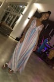 The dress fit great. It was long enough, comfy, and flowy. The chest area has a lot of coverage. - Brianna C.