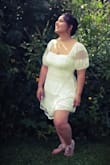 This dress is cute but fits funny on the chest area . - Daniela Z.