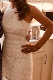 This dress was great for my bridal shower, I like that the material is nice and thick. It was a perfect length on me, not too short. You can wear a strapless bra with it and don't have to worry about anything showing or going bra-less. I got a Small and it has just a bit of stretch. - CHRISTINE E.