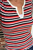 I ordered a medium based on the model's sizing and so glad that I did. The small would not have fit. - Tiffany