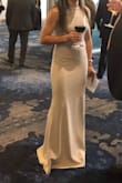 I just received the dress I won, and it is just beautiful! I absolutely love it. The quality of the fabric is wonderful. Is a good dress for any formal occasion. - Sara C.