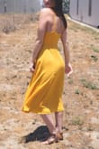 I really like this dress! It is a bit loose in the waist, but I wouldn't go smaller. I love the color and the length. The first one I bought had a messed up zipper, so beware of that. - Laura P.
