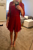 This dress is perfect for a fall wedding! I got a small, and it was a little big, probably could have went for an XS but I still love it. No stretch in the dress, but it is loose fitting around the hips so it is still comfortable! Also a little longer on me than the model, because I'm a lot shorter. - Elena B.