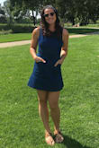 Love the dress, I am 5'7 and it was a tad short, but not inappropriate. It flares for me at the right point so will hide a larger butt like mine nicely! The open back is nice for a warmer day so I didn't feel too hot. The pockets are a great addition too and are hidden perfectly if you don't use them. - Emma G.