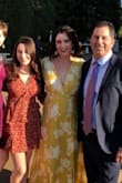 I wore this dress to a very classy wedding and received a ton of compliments. Normally I would wear a medium, but chose to get a small based on my body measurements and comparing them with other reviews. I didn't need to wear a bra with it, and it wasn't worried about it gaping open. Love this dress! - Lindsay D.