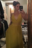 This is such a beautiful dress. I got it for a photo shoot for my 30th birthday. It's so vibrant, and the design at the waist is so pretty! It's very no-nonsense with the sizing though. Returned the small because it was huge. Now the extra small looks like it's been painted on me. Being short, it's a bit long, but can be fixed with a nice size heel. - Angela M.