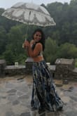 First of all it was delivered in less than a week which was perfect. The fabric is very good and soft. The only problem is that the skirt is way too long and even wearing high heels is still long and I rolled it up and it was still long but I am keeping it because everyone loved it too! - Deise C.