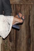 Wore these for my wedding. Loved the little bit of style in the braided strap. Also loved the block heel for the stability. After wearing the shoes for 5 hours though, my feet were done. But in all fairness I have ridiculously high arches and I usually don't get much support in any heels. - Colleen K.