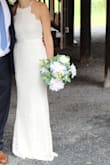 I ordered this dress about 9 days before my wedding on a whim. I made the best decision in doing so. I received countless compliments while wearing this dress and paid LESS THAN $20!!! I mean COME ON! Who can say their dress cost that little?! Granted, the adjustable straps on the back sort of categorized it as cheaper, but I suppose that could be a relatively simple alteration. I could've used about 2 inches hemmed off the bottom but didn't really have the time nor desire considering I'd already paid so little. The 4 inch heels would probably be the bare minimum I'd suggest if of similar height. - Colleen K.
