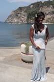 Based on the previous reviews I chose a large when I should have done medium. Had to get it taken in and hemmed. But after all that, it was an amazing dress. Wore it to my best friend's wedding in Italy this summer. Received many compliments and couldn't beat the price - Luann M.