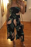 This jumpsuit fits true to size and is great quality! I love the pattern! Definitely one of my faves! - Samantha D.