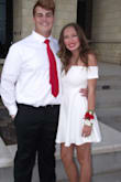 This dress fit perfectly. Material is stretchy and comfortable. Sassy and classy! - Tawni C.