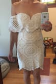 If you're worried about this dress falling down, like I was, don't be... the material is much higher quality than I expected and it has a built-in bra with grippy strips around the neckline so that the dress stays up. I did return it because my fiance was less than thrilled with the style of the dress, and since I'd planned on wearing it to our city hall wedding, it would be helpful if he doesn't seriously dislike my dress, lol. Fit perfectly!  Would have been cute for my bridal shower.  If you like the style, get this one... you'll be very pleased with the quality! - Heather K.