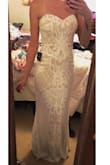 This is my wedding dress, yall! I cannot wait to wear this beautiful dress. It's just like the picture. It has small, delicate sequins all over and a lined, thinly padded bust. I'm a size 4, and a S fits perfectly. - Elizabeth L.