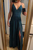 If you have an hour glass figure, this dress is very flattering. The open back is beautiful. Only get this dress if you feel comfortable wearing low cut. I might have to take in a few centimeters from the side cleavage and hip areas. - Maria A.