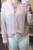 Wore this shirt to work and it was light airy and comfortable! Received a lot of compliments which is always nice! - Karley B.
