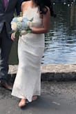 Used this for my simple wedding ceremony with our parents and it was simple and elegant and fit perfectly- I have an apple type body and the ribbon accentuated my waist made me look like I have curves. I'm also on the short side so had to hem it. Its got some stretch so its comfortable. Be careful with the lace tho it can get caught and get ripped. Also the cream color looked great on photos so don't be put off with it. Its a beautiful dress don't hesitate and just get it! - Jessire P.
