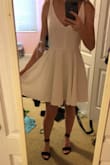 This dress is gorgeous!! It fits very well with my body and it's the perfect length! Very comfy and perfect for homecoming! - Anna D.