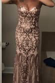 I ordered up a size due to bust size (like suggested on website) and it fits perfectly! If I wanted to get it altered I could but it's not necessary! It is a DREAM. I tried it on and my husbands reaction was perfect! He loved it as much as I do! Will be wearing to his Marine Corps Birthday Ball in November! - Katherine W.