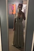 This dress is amazingly good especially for the cost. I bought 4 of these for my bridesmaids for my Holiday theme wedding in December and all the girls loved it. This dress is very opened in the front, but nothing that can't be fixed. Can't wait to see them all in them :) - Mindi-Elyse V.