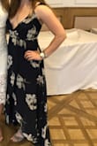 Love this dress. It's super flowy and comfortable. Fit beautifully. I have a small chest and had to use some body tape to make sure I didn't give everyone a free show.
I am normally a medium in Lulus dresses and a medium in this dress fit perfectly.
Length was okay with heels. - Kristina I.