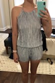 This material is a little thin, but not too thin. I like the pattern and this is definitely a great summertime romper. I do have a long torso and think this romper is a bit on the shorter side for me. However, I bought it on final sale and it was a great deal so I'll be keeping it! - Madeline B.