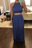 I don't own any other two piece items and this was a large leap for me fashion-wise! The color is beautiful and the skirt hangs wonderfully. The top is a little thin and can be see through without sticky bras/pads. I do love that the top is adjustable, making it good for making it tight enough to hold up the girls! - Madeline B.